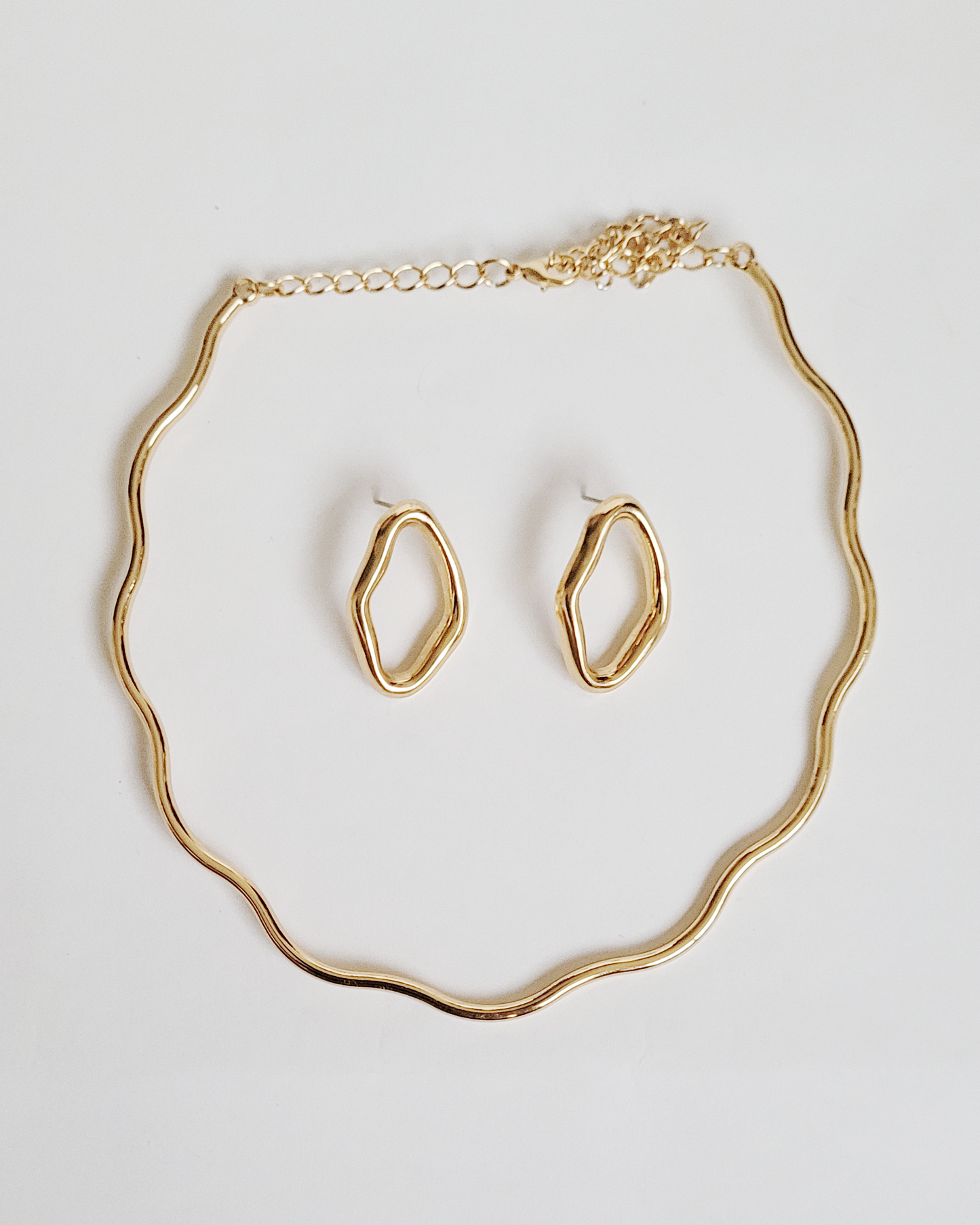 brinco dourado orgânico