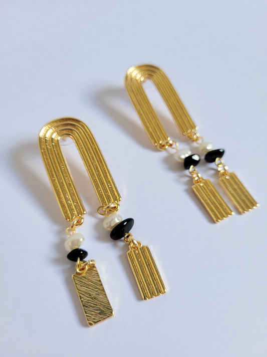 brincão geométrico pérola com preto