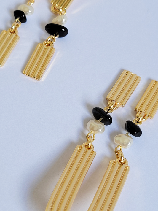 brincão geométrico pérola com preto