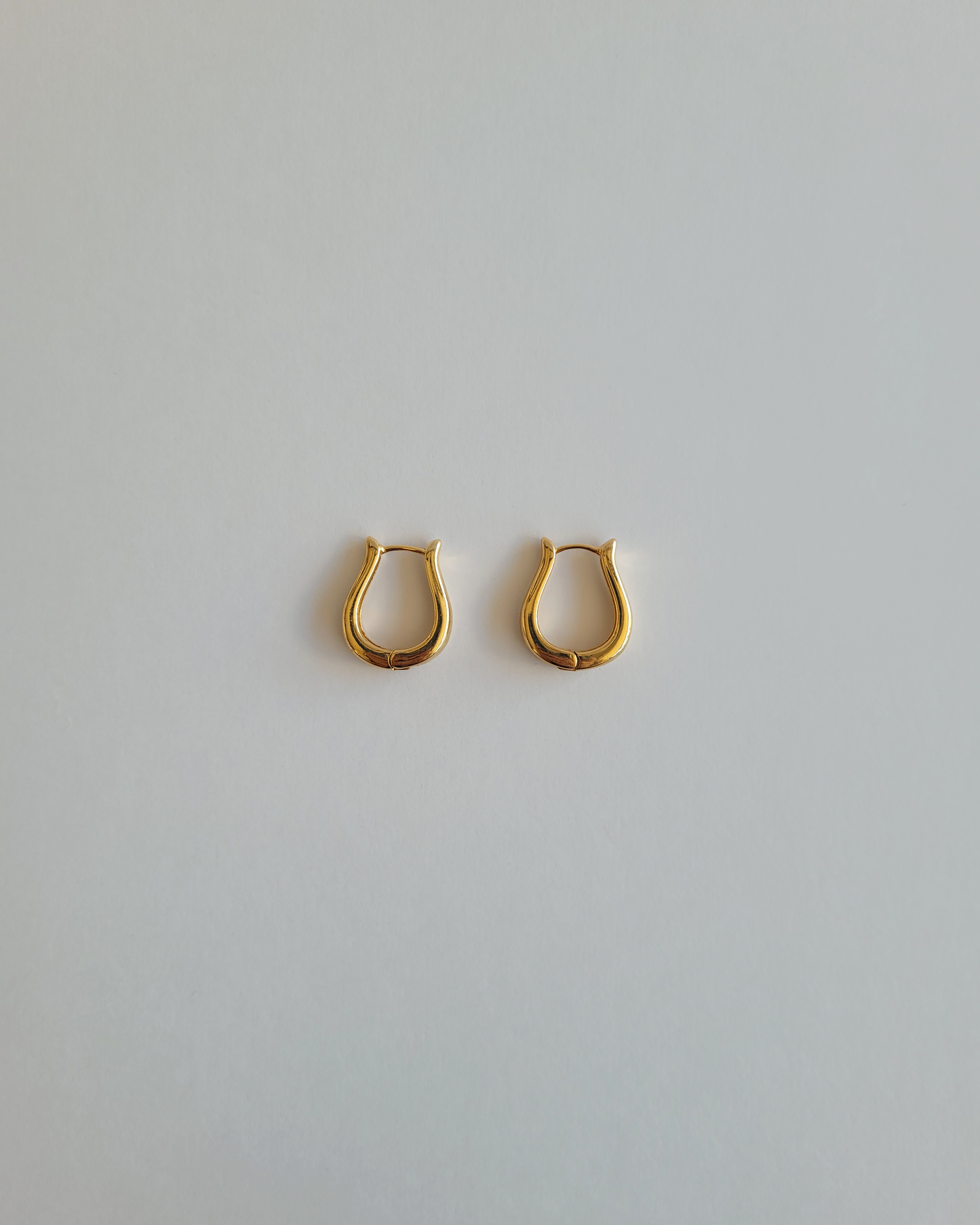 argola onda dourada