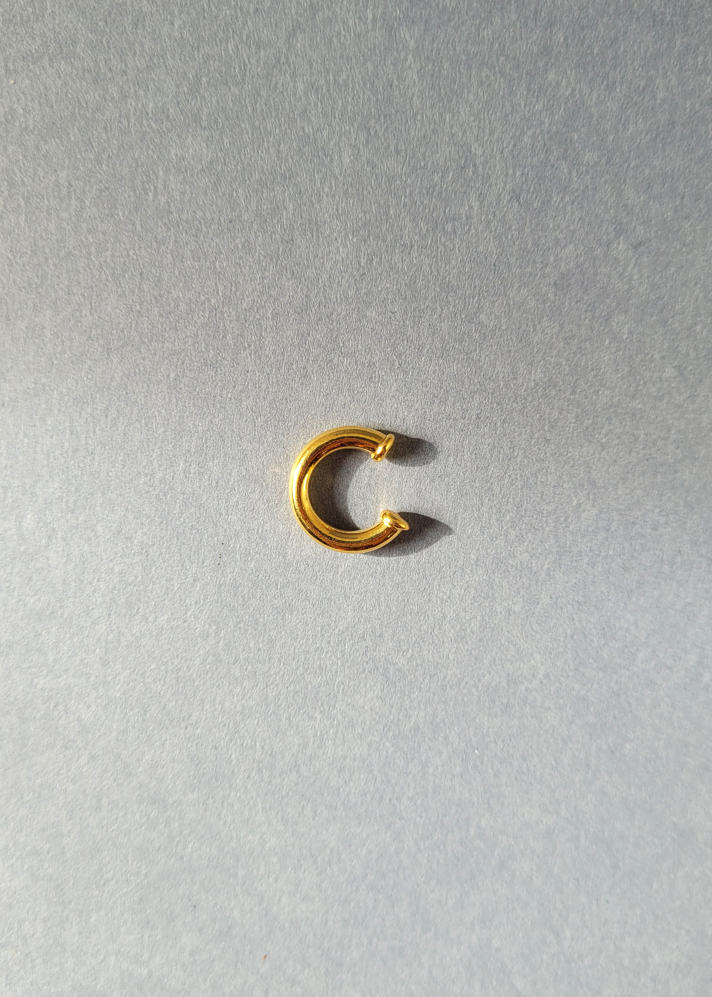 earcuff dourada mini