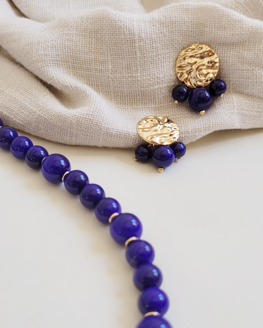 brinco bolinhas azuis com dourado